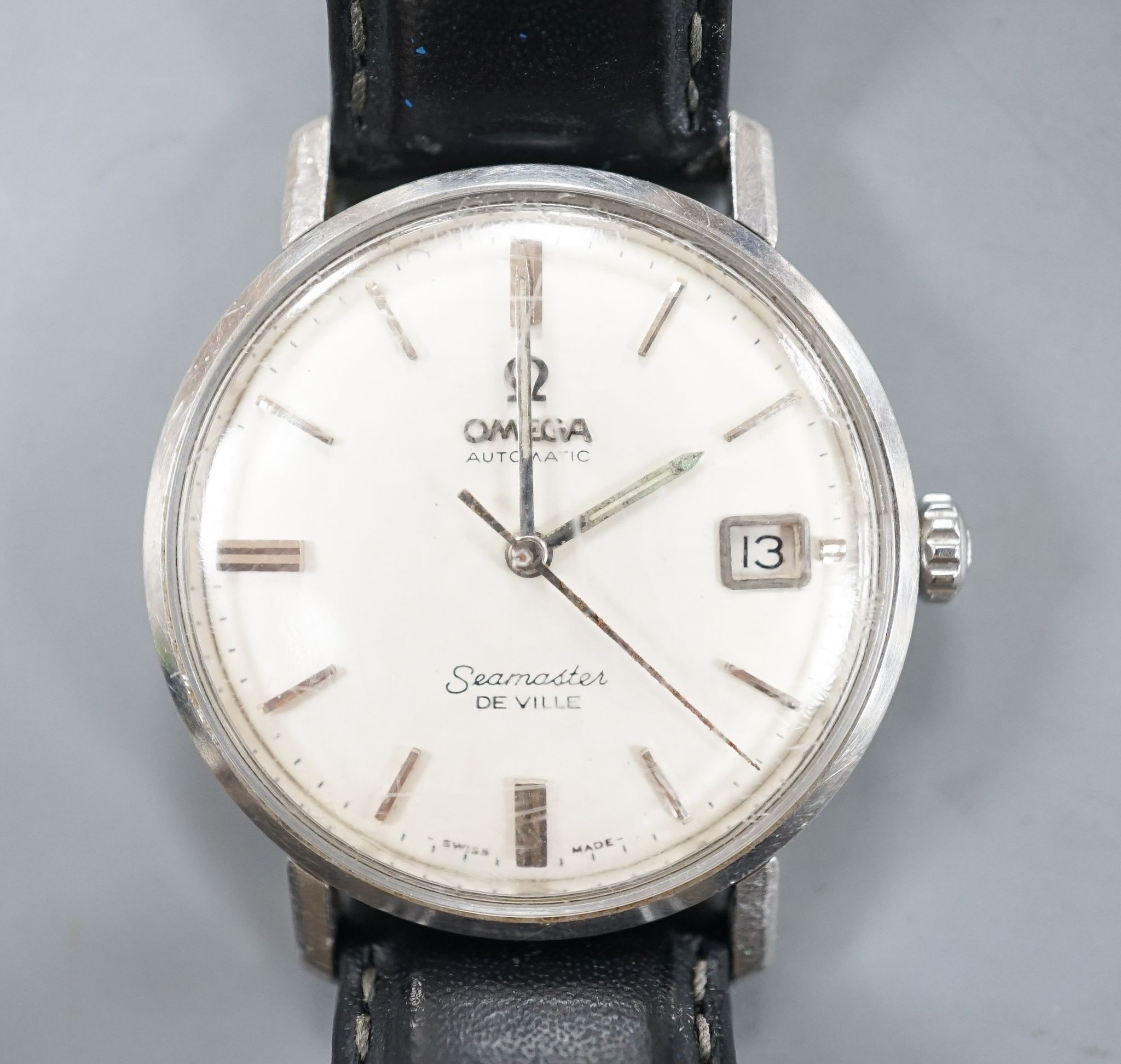 A gentleman's mid 20th century stainless steel Omega Seamaster De Ville automatic wrist watch, on associated strap.